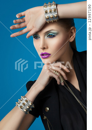 Portrait of woman with bracelets Portrait of woman with bracelets 12997190