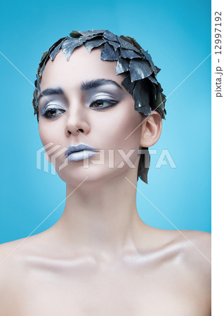 frozen woman and hat of leaves frozen woman and hat of leaves 12997192