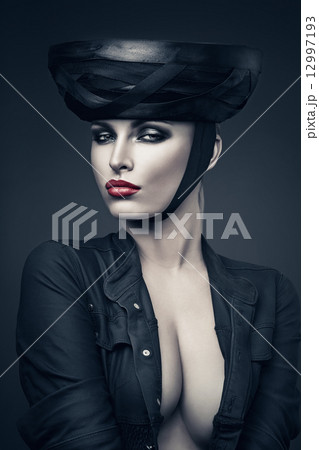 imperious woman in black with red lips imperious woman in black with red lips 12997193