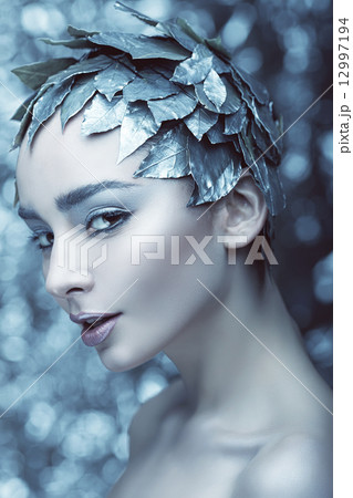 woman with leaves on head woman with leaves on head 12997194