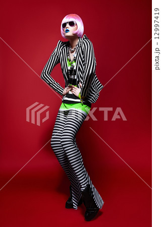 Woman in a striped suit 12997419