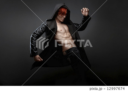 sexy man with red hair in a coat 12997674