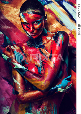girl in colourful paint strokes 12997744