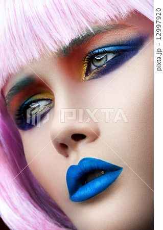 Face of woman with blue lips 12997920