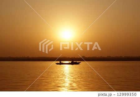 Fishermen's Boat at Sunset 12999350