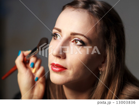 Professional makeup in studio. Professional makeup in studio. 13003836