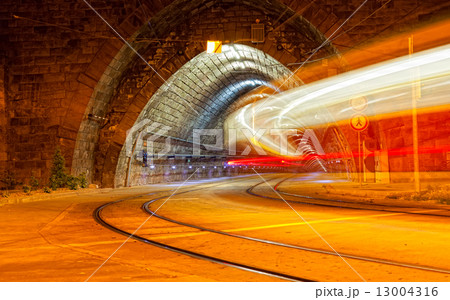 tram drives in the tunnel at night, long endurance tram drives in the tunnel at night, long endurance 13004316