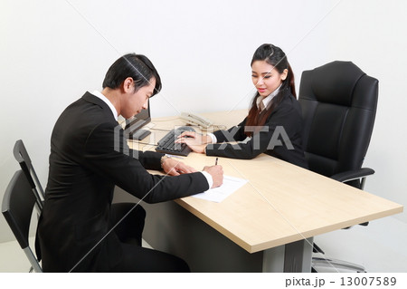 man and woman at office working staff visitor man and woman at office working staff visitor 13007589