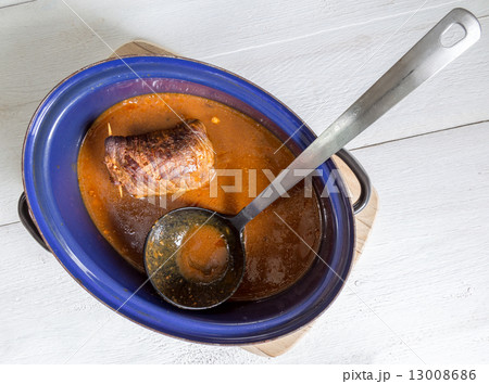 Roulade of beef in pan with sauce Roulade of beef in pan with sauce 13008686