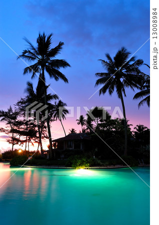 Sunset and illuminated swimming pool, Bentota, Sri Lanka Sunset and illuminated swimming pool, Bentota, Sri Lanka 13008984