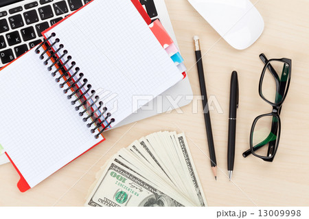 Office table with pc, supplies and money cash 13009998