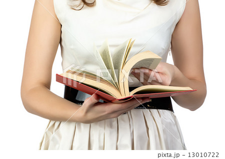 Image of the book in woman's hands 13010722