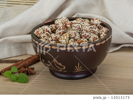 Peanut in honey with sesame seeds 13013173