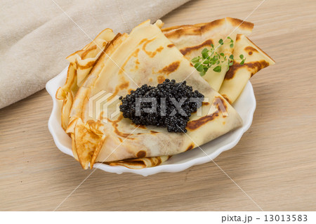 Pancakes with black caviar Pancakes with black caviar 13013583