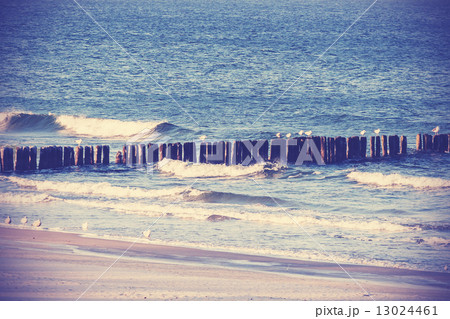 Vintage retro filtered picture of a beach, peaceful background. 13024461