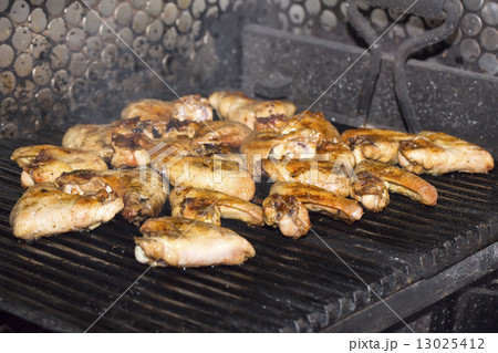 Wings Grill cooked on the grill in the restaurant 13025412