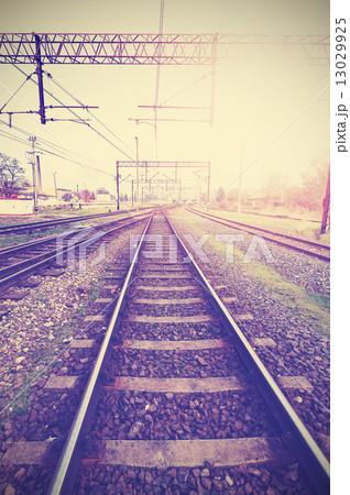 Vintage retro filtered picture of railway tracks and infrastruct Vintage retro filtered picture of railway tracks and infrastruct 13029925