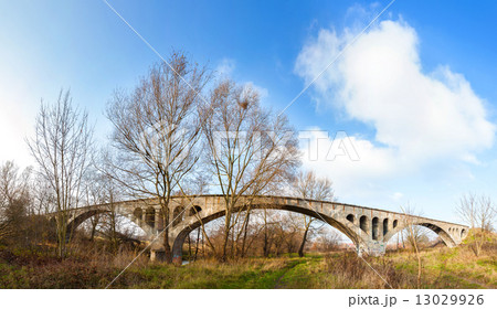 Long concrete arch bridge over Parseta river, Poland. 13029926