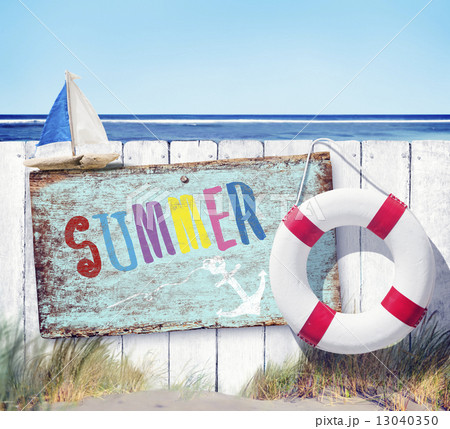 White Fence and Summer Signboard on Beach White Fence and Summer Signboard on Beach 13040350