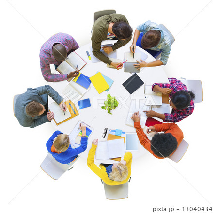 Group of Diverse People Brainstorming in Team 13040434