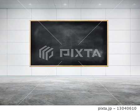Blank Black Chalkboard on a Boardroom Wall 13040610