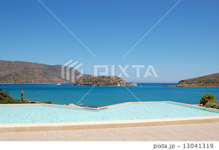Swimming pool by luxury villa with a view on Spinalonga Island, Swimming pool by luxury villa with a view on Spinalonga Island, 13041319