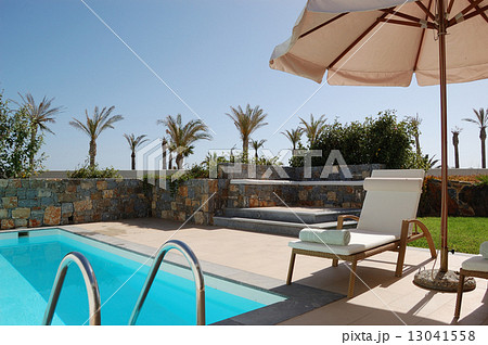 Sunbed and swimming pool at the luxury villa, Crete, Greece 13041558
