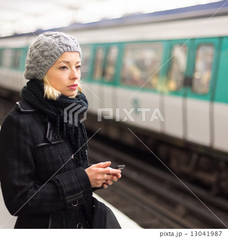 Woman on a subway station. Woman on a subway station. 13041987
