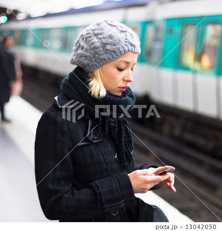 Woman on a subway station. Woman on a subway station. 13042050