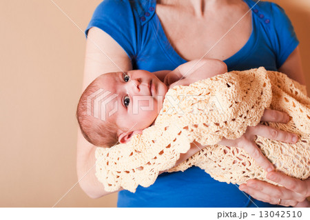 Mother with her newborn baby Mother with her newborn baby 13042510