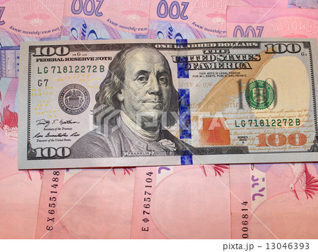 hundred of dollars and grivnas bank notes 13046393