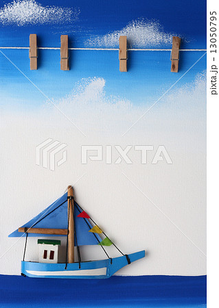Picture Board with Wooden Paper Clip on Blue Sky, Ocean and Boat Picture Board with Wooden Paper Clip on Blue Sky, Ocean and Boat 13050795