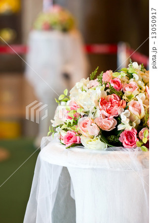 Artificial flowers bunch decorated on table. 13050917