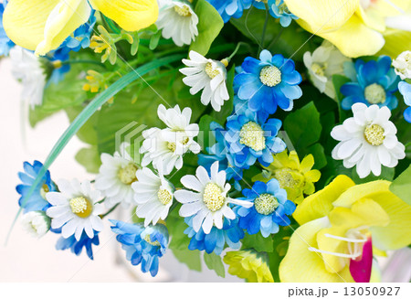 Close up of colorful artificial flowers. Close up of colorful artificial flowers. 13050927
