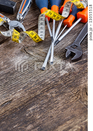 tools kit frame on wooden planks tools kit frame on wooden planks 13055518