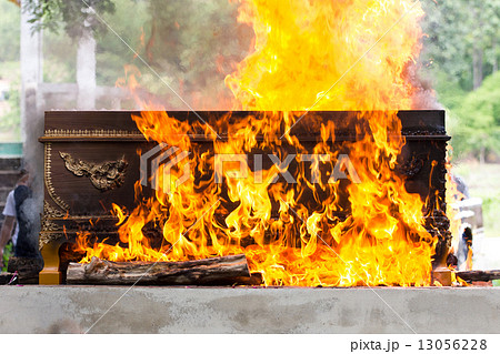 cremation at graveyard in thailand, coffin burning. 13056228