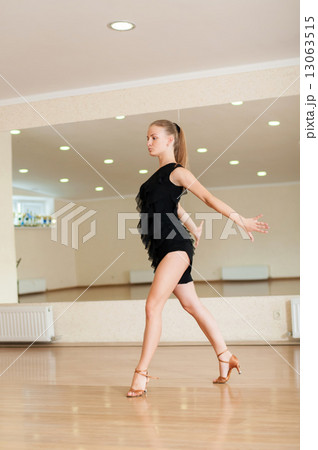 Young girl dancer doing exercises in a dance class 13063515