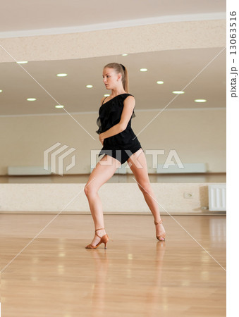 Young girl dancer doing exercises in a dance class 13063516