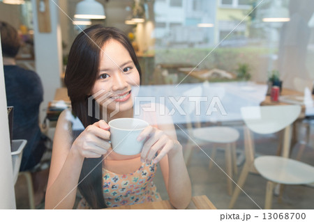 Smiling Woman looking out Smiling Woman looking out 13068700