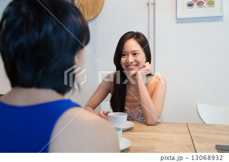 Friends chatting in cafe 13068932