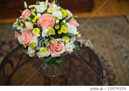 Bouquet on a glass table. Bouquet on a glass table. 13074329