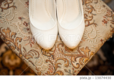 White shoes on a chair. White shoes on a chair. 13074430