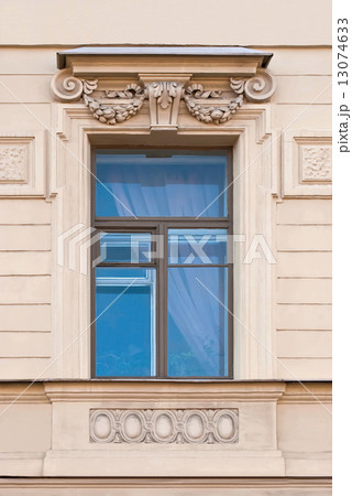 A window with a bas-relief. A window with a bas-relief. 13074633