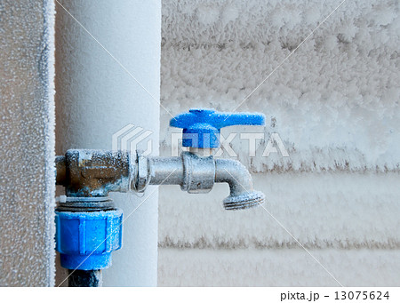 Frozen faucet in winter 13075624