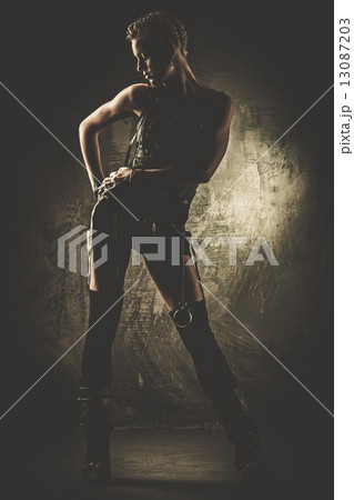 Steampunk girl looking at stopwatch 13087203