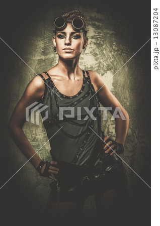 Attractive steampunk girl wearing googles Attractive steampunk girl wearing googles 13087204