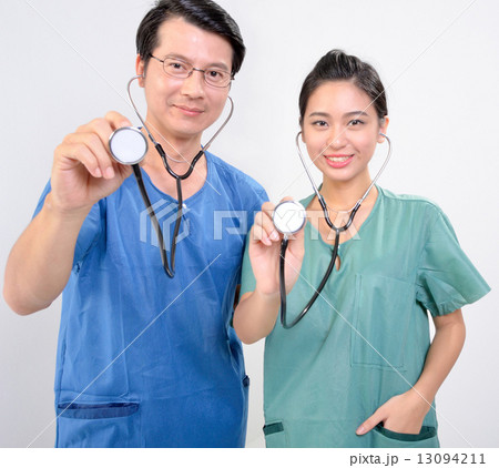 Doctor holding stehoscope 13094211