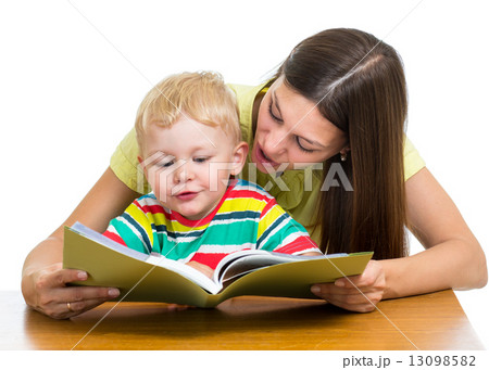happy mother reading a book to kid 13098582