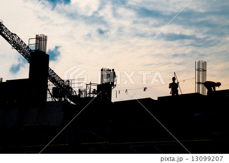 Man at work at construction site 13099207