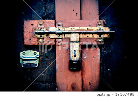 Retro vintage style picture of wooden door with lock. Retro vintage style picture of wooden door with lock. 13107499